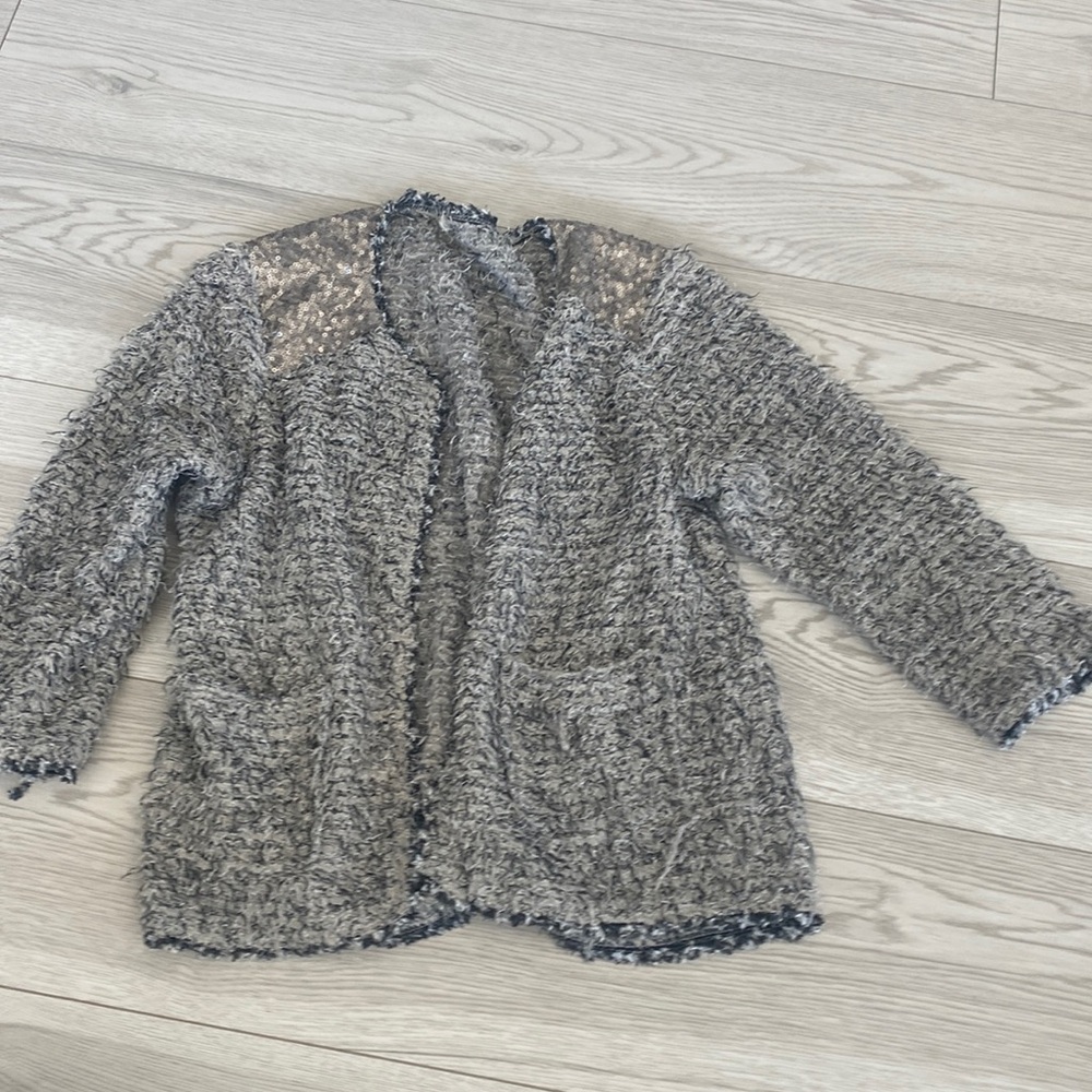 fuzzy crocheted grey jacket. perfect to throw over a dress or casual outfit